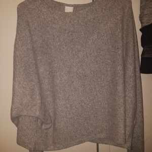 Gray fleecy pullover sweater.